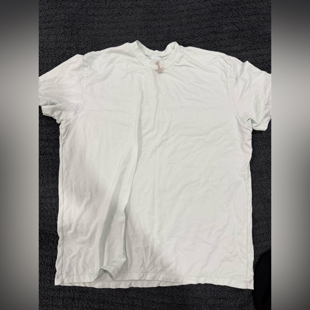 Worn once. Wine stained in the neck.